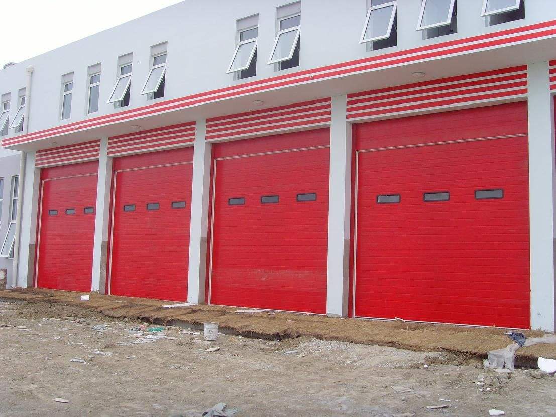 Why should industrial doors be installed at Longgang Fire Station